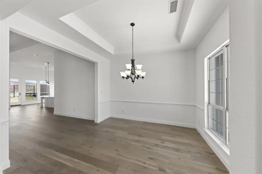 Representative unfurnished interior of a home built from the Newport by Windsor Homes in Nelson Lake Estates, Rockwall (Image 17).