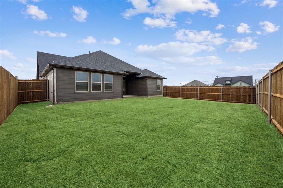 Exterior details and patio area of a home in Hadley Farms, Godley (Image 21).