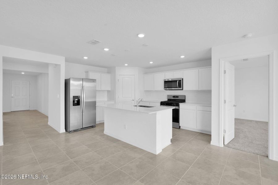 Furnished interior view inside a new home in Wells Landing, Jacksonville (Image 6).