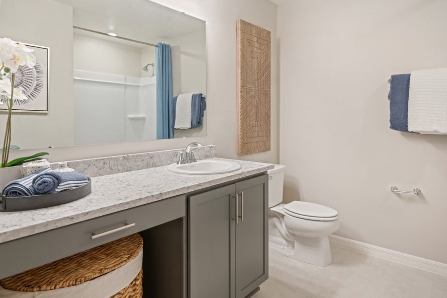 Extended vanity with knee space at bath 2