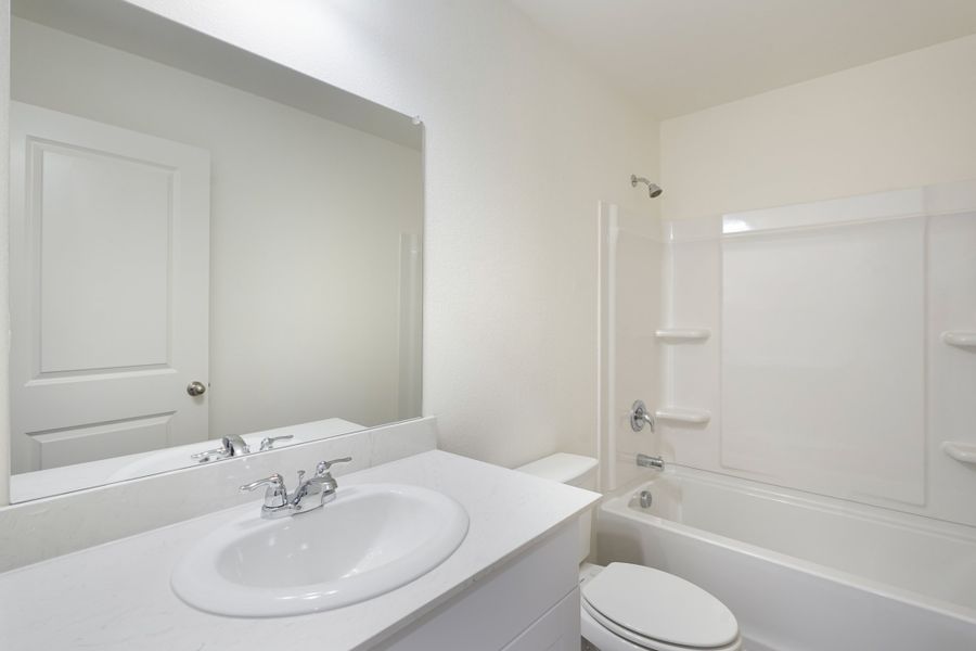 Representative furnished interior of a home built from the Crescent by Starlight Homes in Broadmoor Village, Cedar Hill (Image 16).
