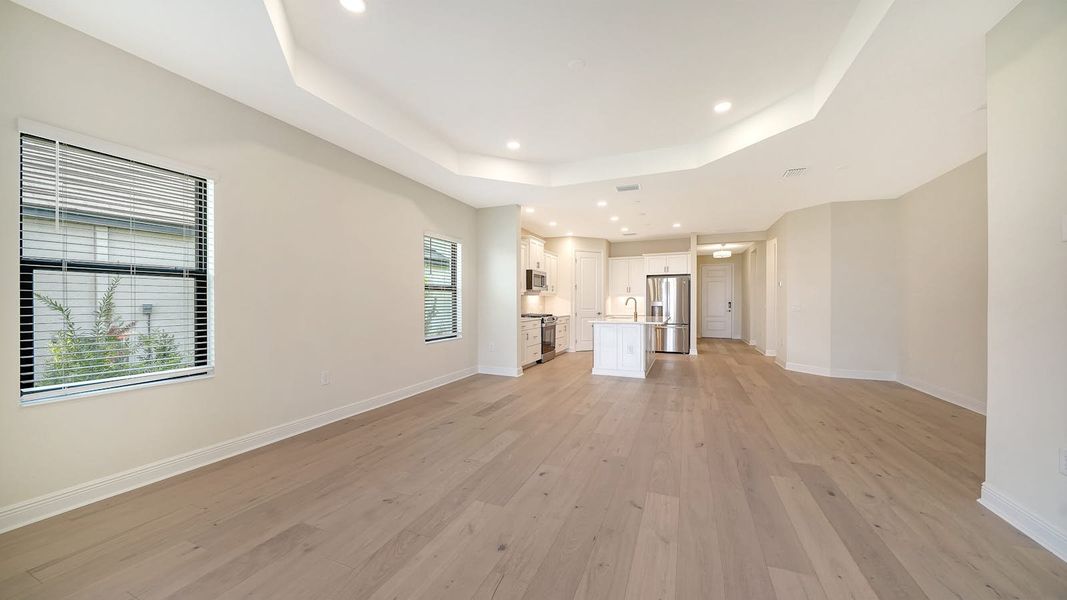 Spacious, unfurnished interior of a new home in Vistera of Venice Real Estate and Homes for Sale in Venice, FL - Neal Communities, Nokomis (Image 14).