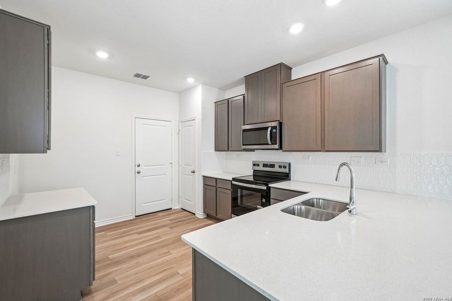 Furnished interior view inside a new home in Nagel Crossing, San Antonio (Image 11).