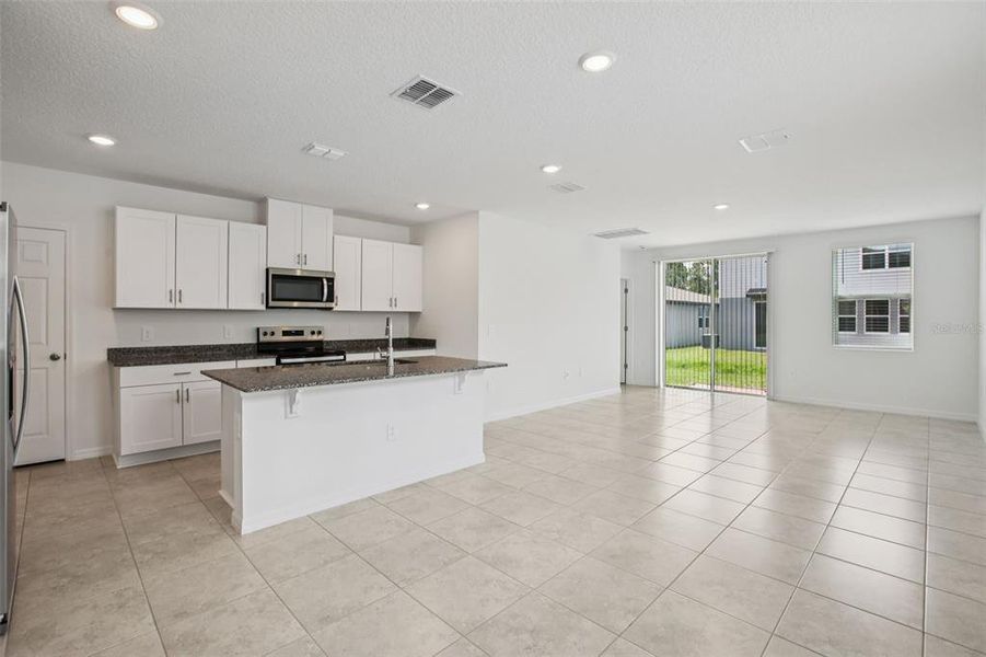 Furnished interior view inside a new home in Villamar - Classic Series, Winter Haven (Image 10).