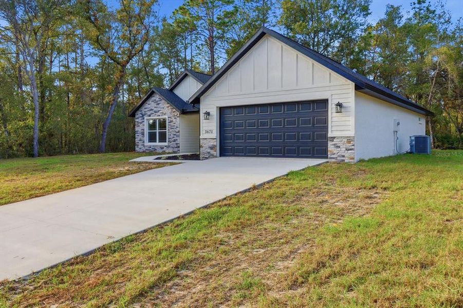 Front exterior of a new home in , Inverness, FL, highlighting curb appeal (Image 22).