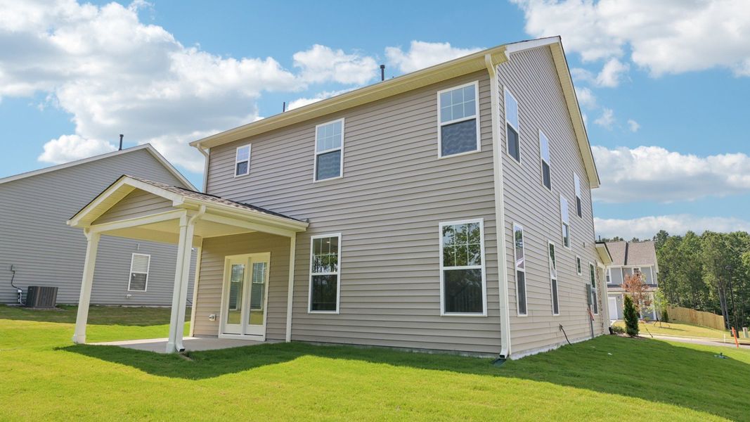 Front exterior of a new home in The Farm at Neill's Creek, Lillington, NC, highlighting curb appeal (Image 23).