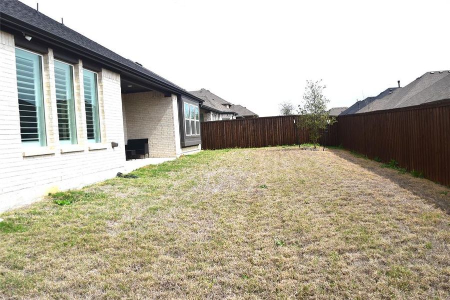 Exterior details and patio area of a home in , Hickory Creek (Image 31).