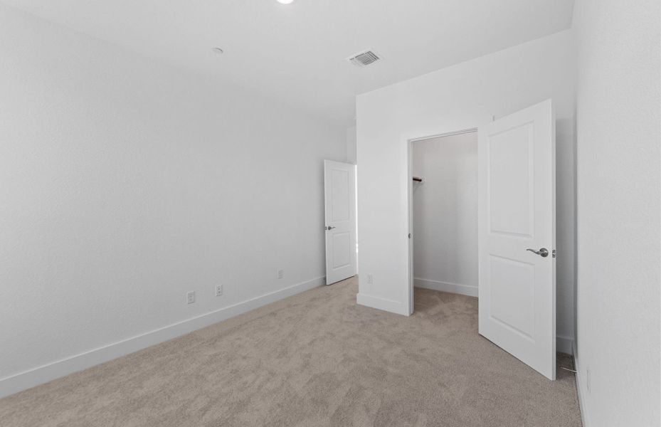 Spacious, unfurnished interior of a new home in Northpoint at Old Settlers, Round Rock (Image 15).