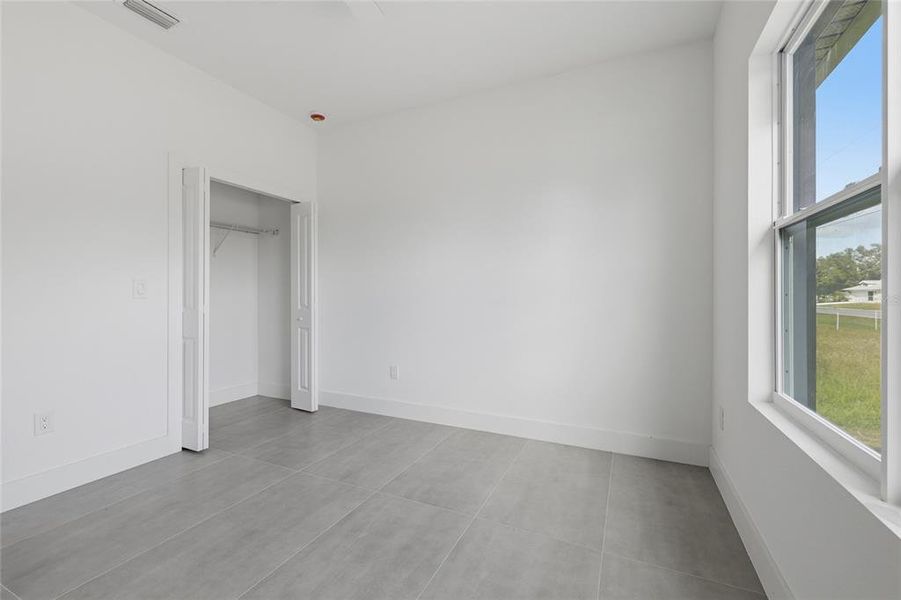 Spacious, unfurnished interior of a new home in , Port Charlotte (Image 22).