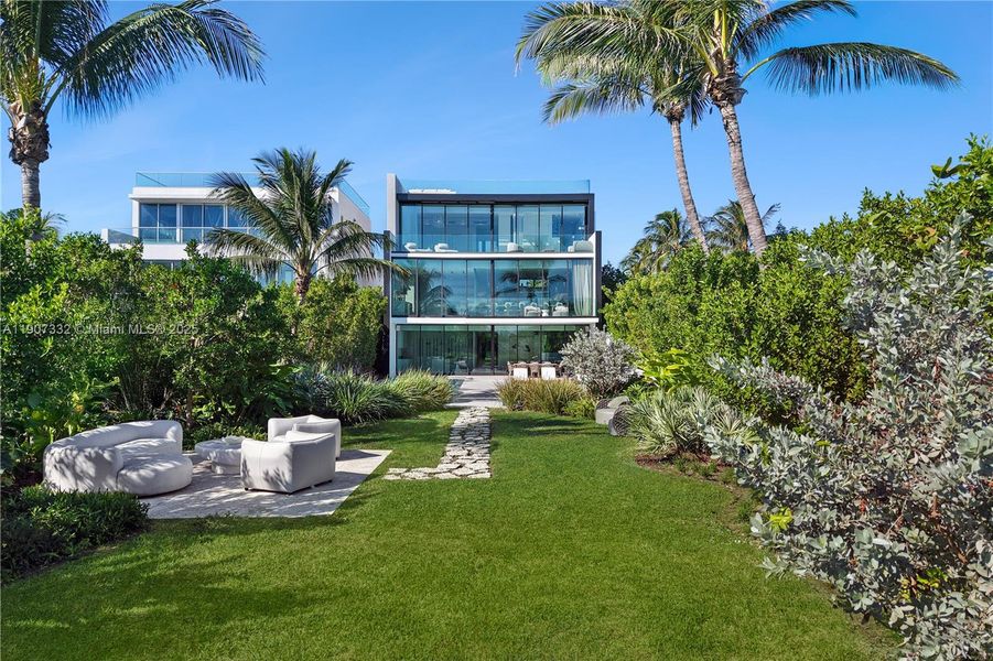 Exterior details and patio area of a home in , Miami Beach (Image 35). Exterior details and patio area of a home in , Miami Beach (Image 35).
