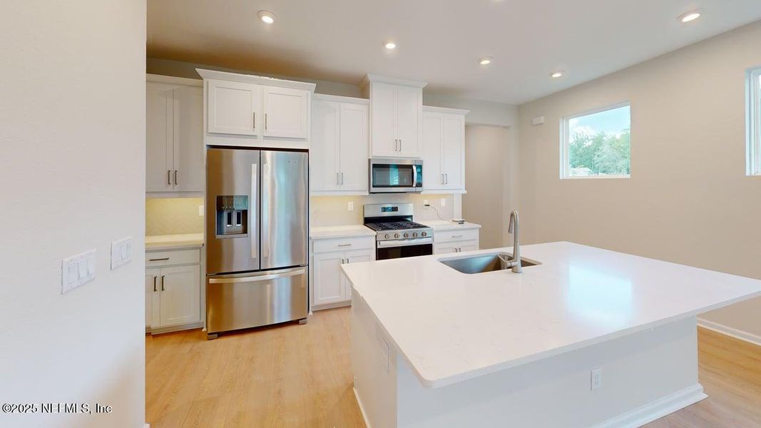 Furnished interior view inside a new home in RiverTown - WaterSong, St. Johns (Image 7).