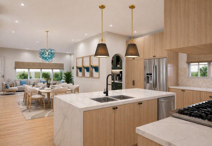 Chef-inspired kitchen with oversized island and custom cabinetry. Chef-inspired kitchen with oversized island and custom cabinetry.