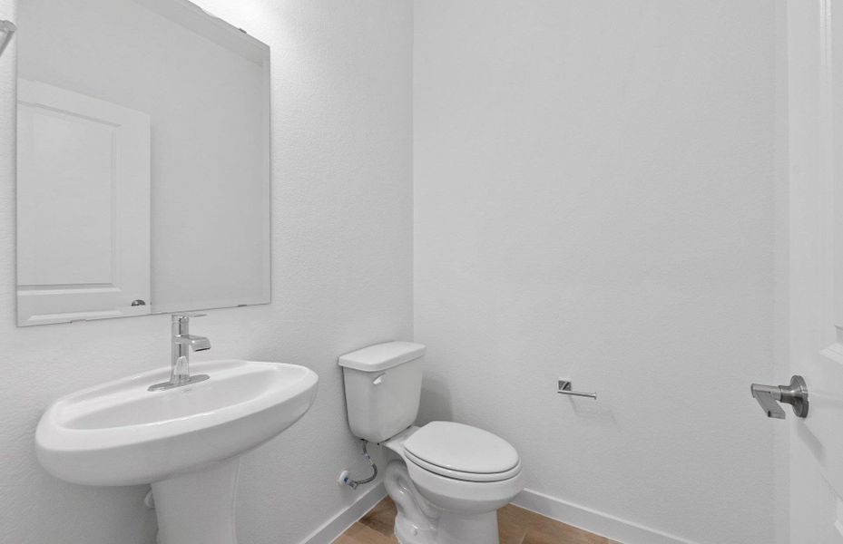 Furnished interior view inside a new home in Wolf Ranch, Georgetown (Image 10).