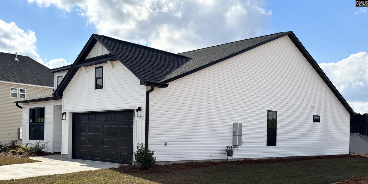 Front exterior of a new home in Rolling Hills, Prosperity, SC, highlighting curb appeal (Image 2).