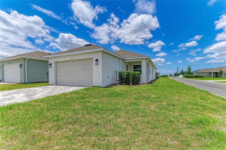 Front exterior of a new home in , Sarasota, FL, highlighting curb appeal (Image 28). Front exterior of a new home in , Sarasota, FL, highlighting curb appeal (Image 28).