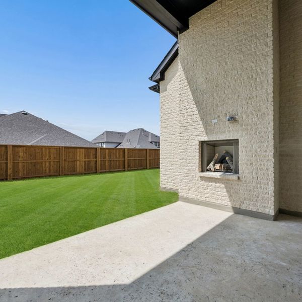 Exterior details and patio area of a home in The Parks at Wilson Creek, Celina (Image 31).
