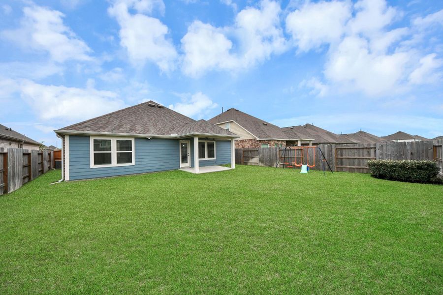 Exterior details and patio area of a home in Marvida, Cypress (Image 4).