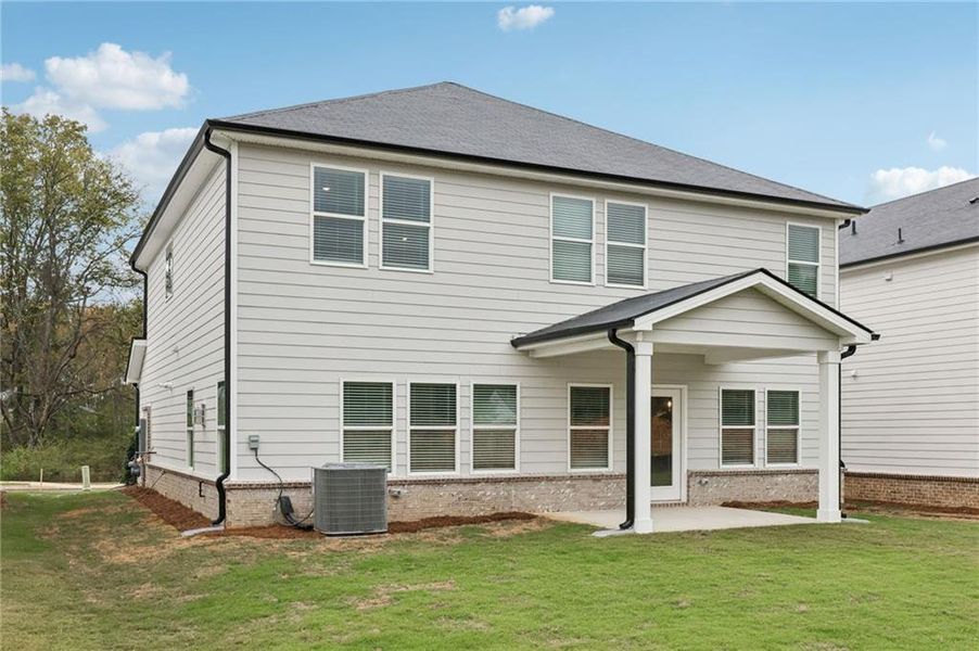 Exterior details and patio area of a home in Westmont Preserve, Powder Springs (Image 26).