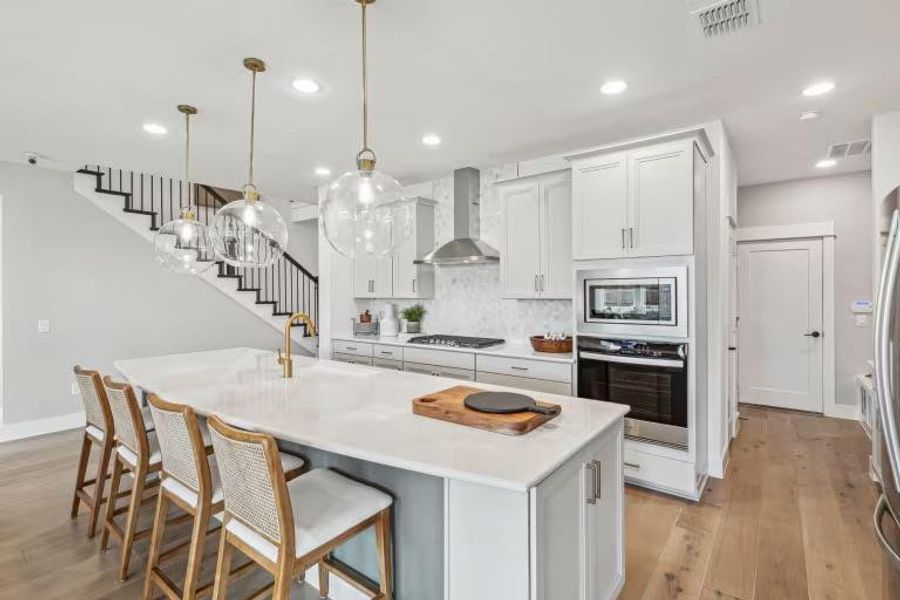 Photo of Pulte model home with same floor plan, not of actual home listed. Photo of Pulte model home with same floor plan, not of actual home listed.