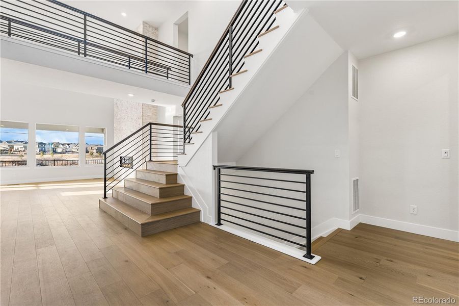 Spacious, unfurnished interior of a new home in Luxe at The Canyons, Castle Pines (Image 39).