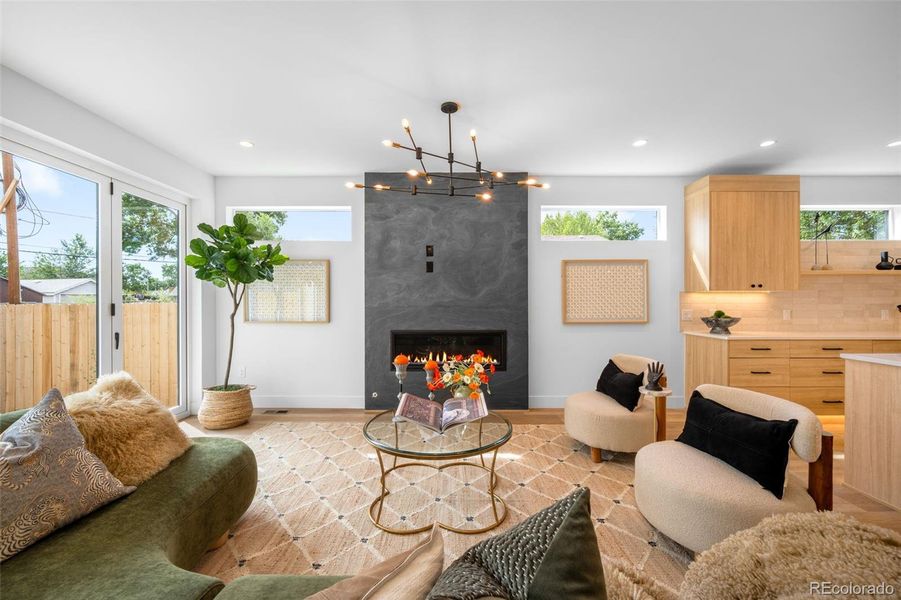 Open floorplan living room with fireplace