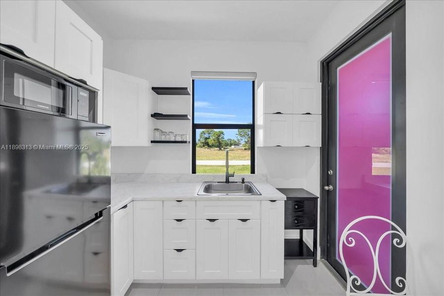 Furnished interior view inside a new home in , Lehigh Acres (Image 17). Furnished interior view inside a new home in , Lehigh Acres (Image 17).