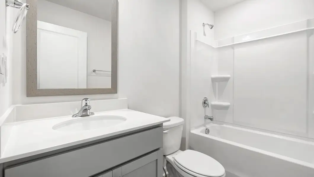 Representative furnished interior of a home built from the SANFORD by D.R. Horton in Stone Creek, Clinton (Image 4).