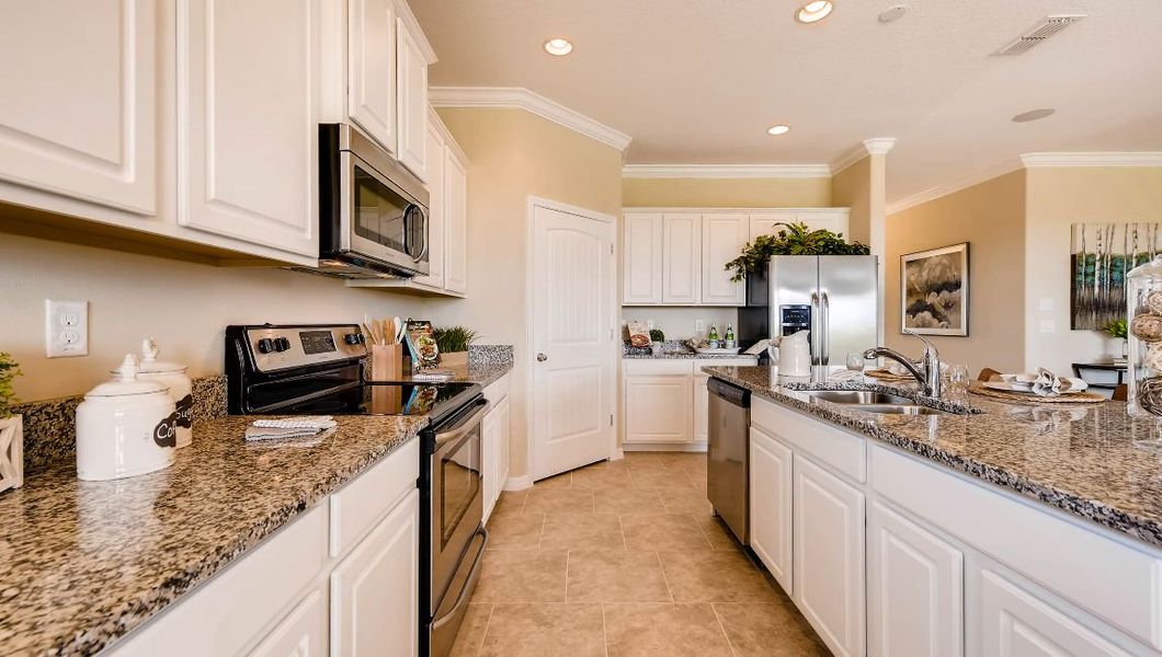 Furnished interior in a model home at Preserves at Lakeside Landings in Winter Haven (Image 33).