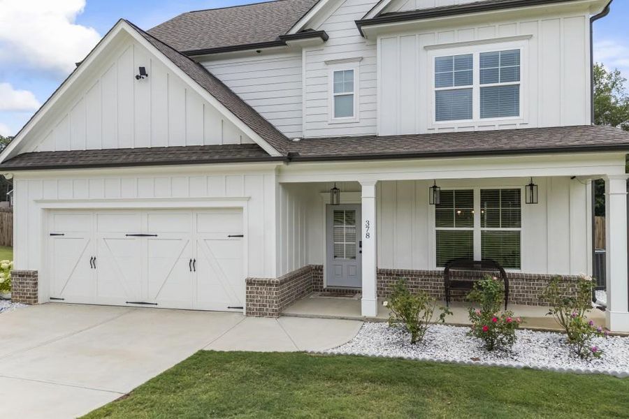 Front exterior of a new home in , Winder, GA, highlighting curb appeal (Image 32).