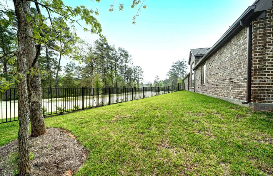 Representative exterior details of a home built from the 3030 by Ravenna Homes in The Woodlands Hills 65′, Willis (Image 27). Representative exterior details of a home built from the 3030 by Ravenna Homes in The Woodlands Hills 65′, Willis (Image 27).