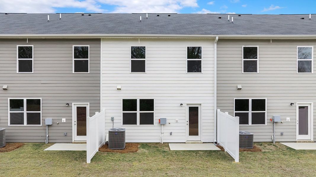 Exterior details and patio area of a home in The Gables at Agricultural Village, Perry (Image 3). Exterior details and patio area of a home in The Gables at Agricultural Village, Perry (Image 3).