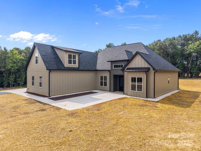 Front exterior of a new home in , Peachland, NC, highlighting curb appeal (Image 23). Front exterior of a new home in , Peachland, NC, highlighting curb appeal (Image 23).