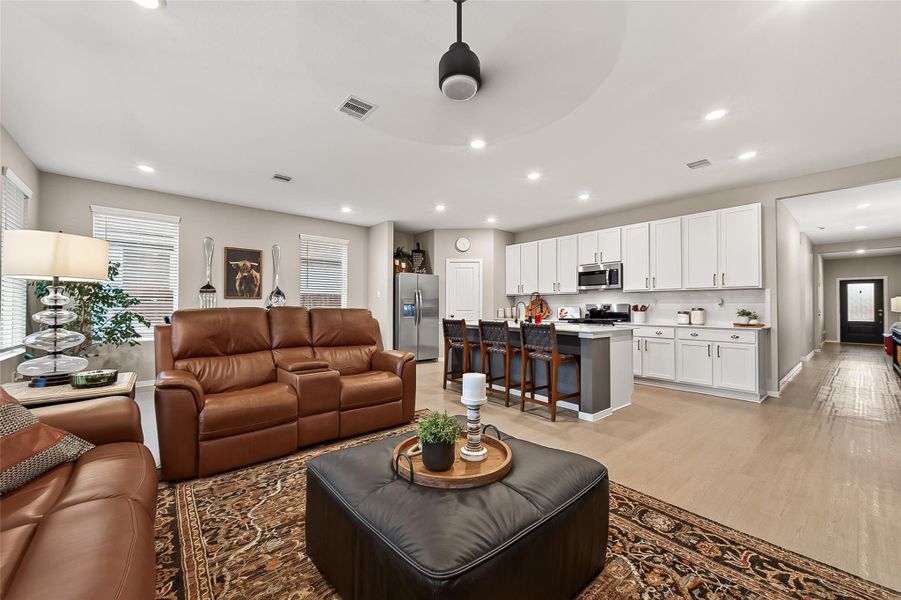 Family room overlooking the open kitchen and dining areas, ideal for everyday living and entertaining. Family room overlooking the open kitchen and dining areas, ideal for everyday living and entertaining.