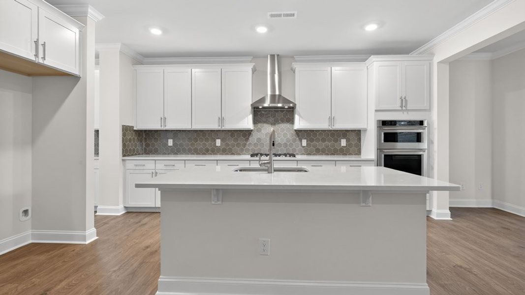 Furnished interior view inside a new home in The Estates Park, Apex (Image 4). Furnished interior view inside a new home in The Estates Park, Apex (Image 4).
