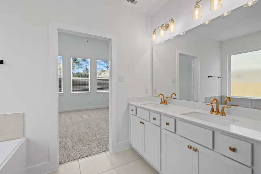 Furnished interior view inside a new home in The Woodlands Hills, Willis (Image 9). Furnished interior view inside a new home in The Woodlands Hills, Willis (Image 9).