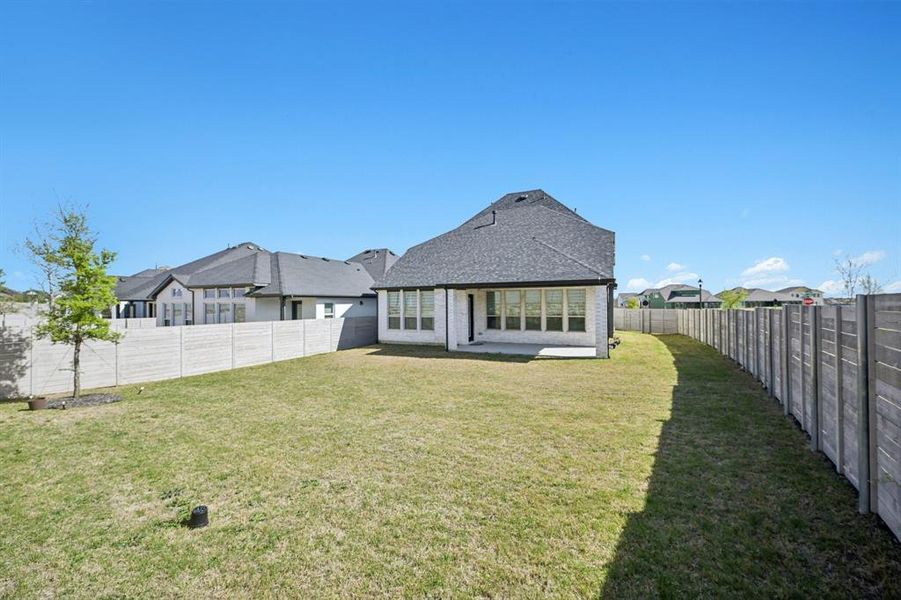 Exterior details and patio area of a home in , McKinney (Image 3).