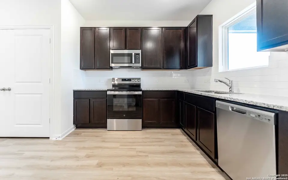 Furnished interior view inside a new home in Katzer Ranch, Converse (Image 2).