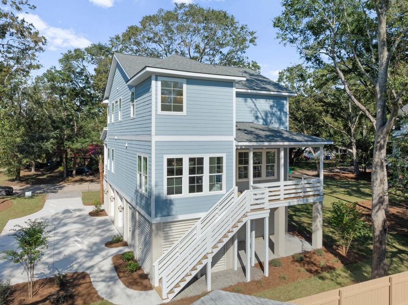 Front exterior of a new home in Ferryboat Landing, Charleston, SC, highlighting curb appeal (Image 1). Front exterior of a new home in Ferryboat Landing, Charleston, SC, highlighting curb appeal (Image 1).