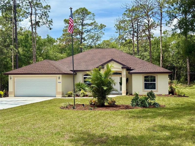 Front exterior of a new home in , Dunnellon, FL, highlighting curb appeal (Image 29).