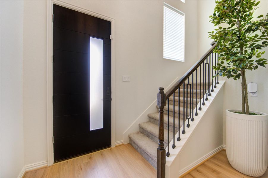 Welcome Home! This massive 8-foot door will impress all who visit.
