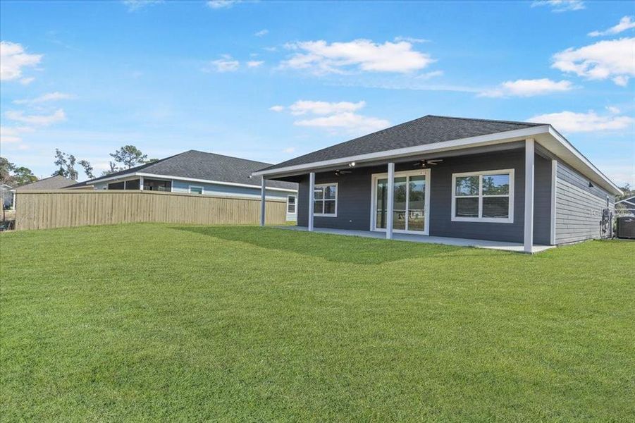 Exterior details and patio area of a home in Grand Oaks, Gainesville (Image 24).