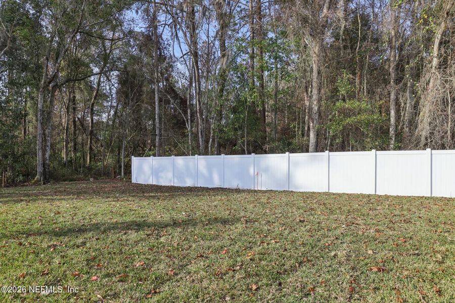 Exterior details and patio area of a home in Cypress Meadows - The Villas, Jacksonville (Image 4).