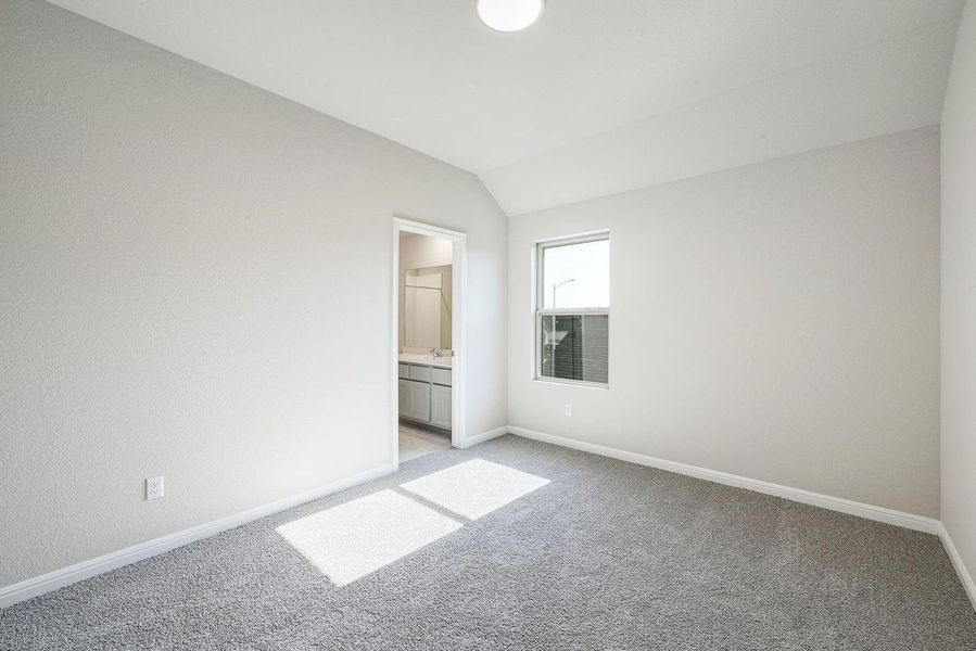 Bedroom in the Willow home plan by Trophy Signature Homes – REPRESENTATIVE PHOTO