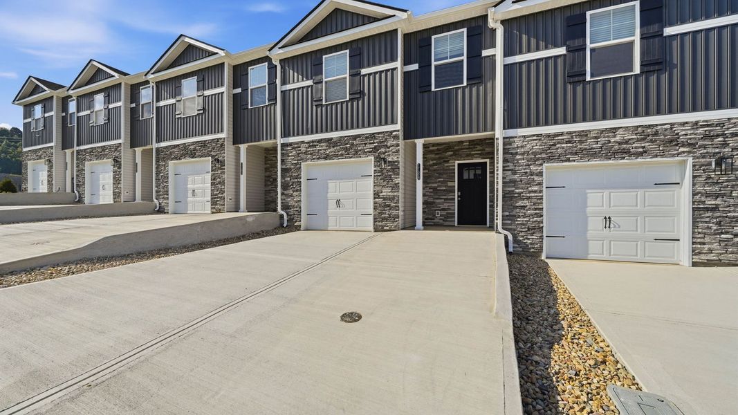 Front exterior of a new home in The Arbor Townhomes, Kingsport, TN, highlighting curb appeal (Image 2).