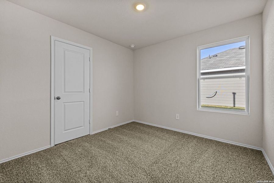 Spacious, unfurnished interior of a new home in Navarro Fields, Seguin (Image 19).