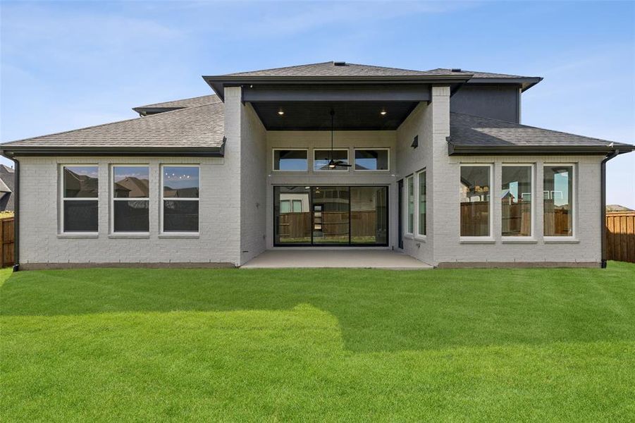 The wonderful covered outdoor patio and spacious fenced back yard create the ultimate family outdoor space in this over the top dream home!