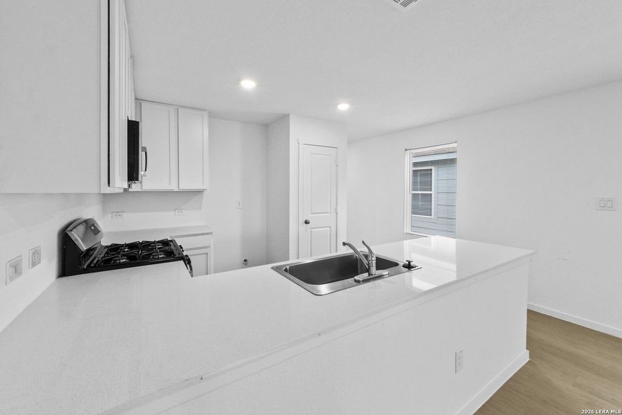 Furnished interior view inside a new home in Spring Grove, St. Hedwig (Image 6).