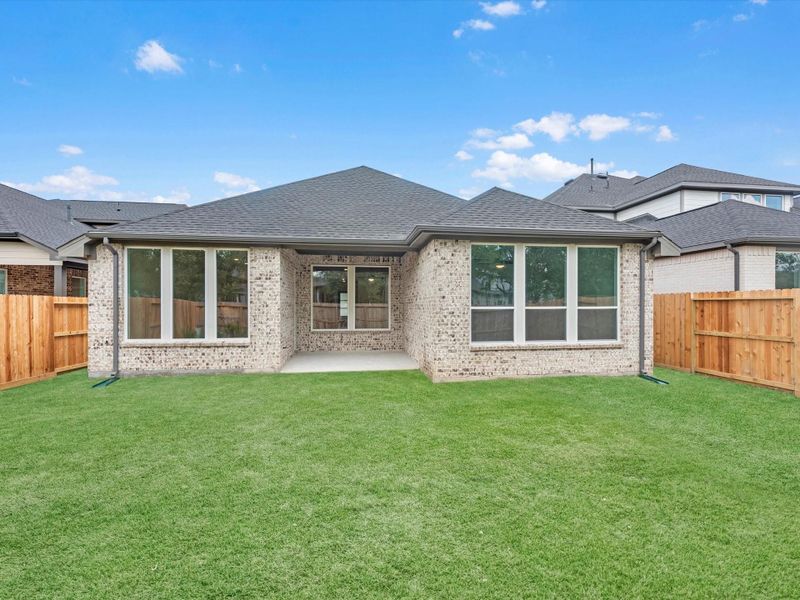 Exterior details and patio area of a home in Tompkins Reserve, Katy (Image 3). Exterior details and patio area of a home in Tompkins Reserve, Katy (Image 3).