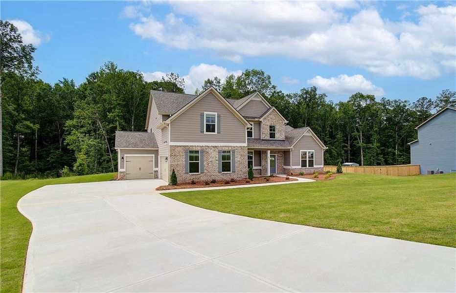 Front exterior of a new home in , Senoia, GA, highlighting curb appeal (Image 19). Front exterior of a new home in , Senoia, GA, highlighting curb appeal (Image 19).
