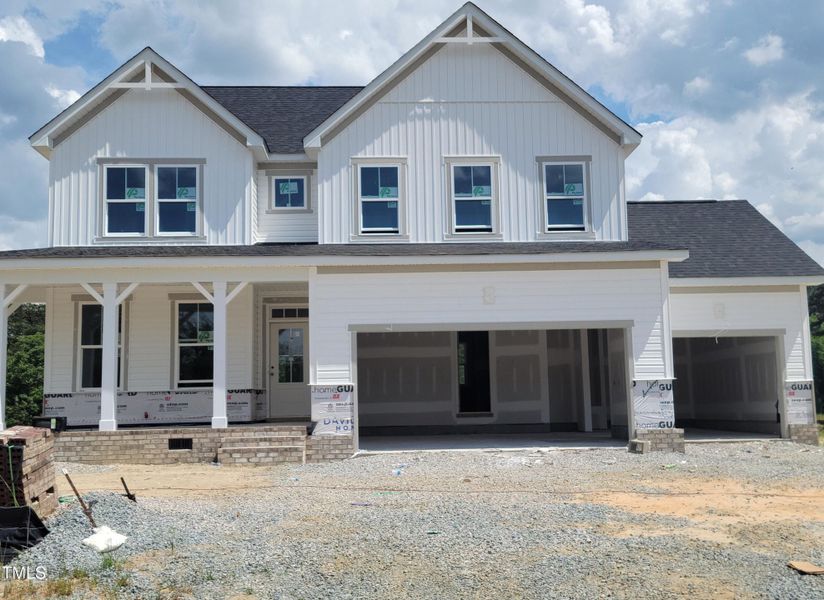 Front exterior of a new home in Tobacco Road, Angier, NC, highlighting curb appeal (Image 60). Front exterior of a new home in Tobacco Road, Angier, NC, highlighting curb appeal (Image 60).